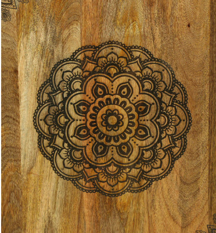 WOOD CURLS handcrafted mango wood cabinet door featuring an intricate, detailed circular mandala carving pattern.