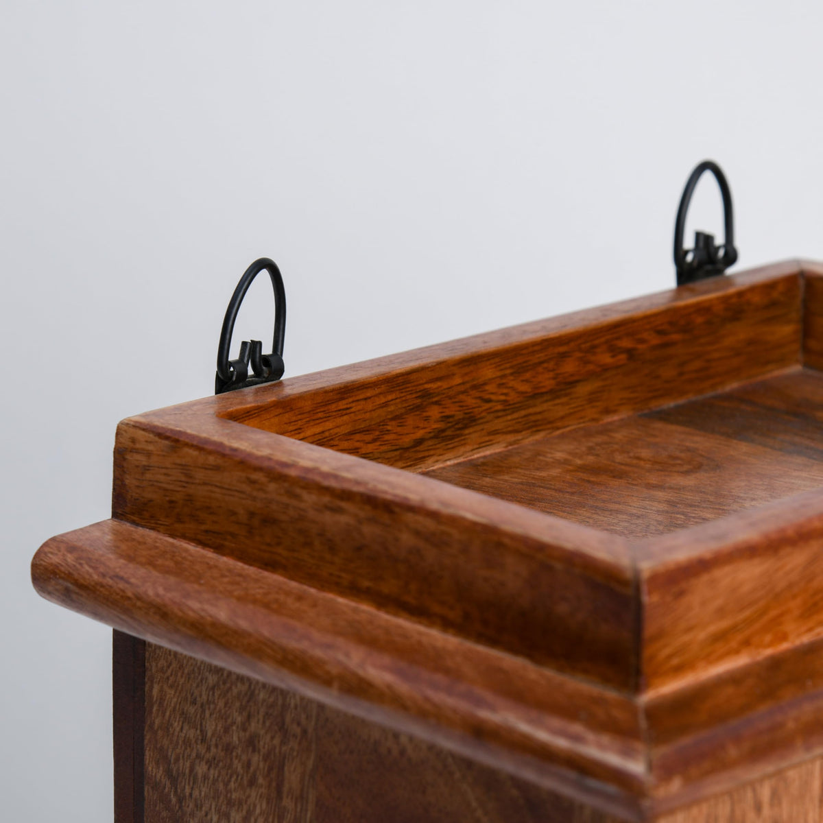 WOOD CURLS wall hanging pooja temple made of brown mango wood with sturdy metal mounting hooks for easy installation