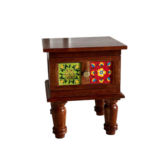 WOOD CURLS handcrafted Sheesham wood bedside table with colourful floral ceramic tile inlay and a storage drawer.