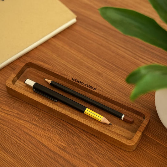WOOD CURLS minimalist solid acacia wood desk organizer tray with pens on a wooden office desk
