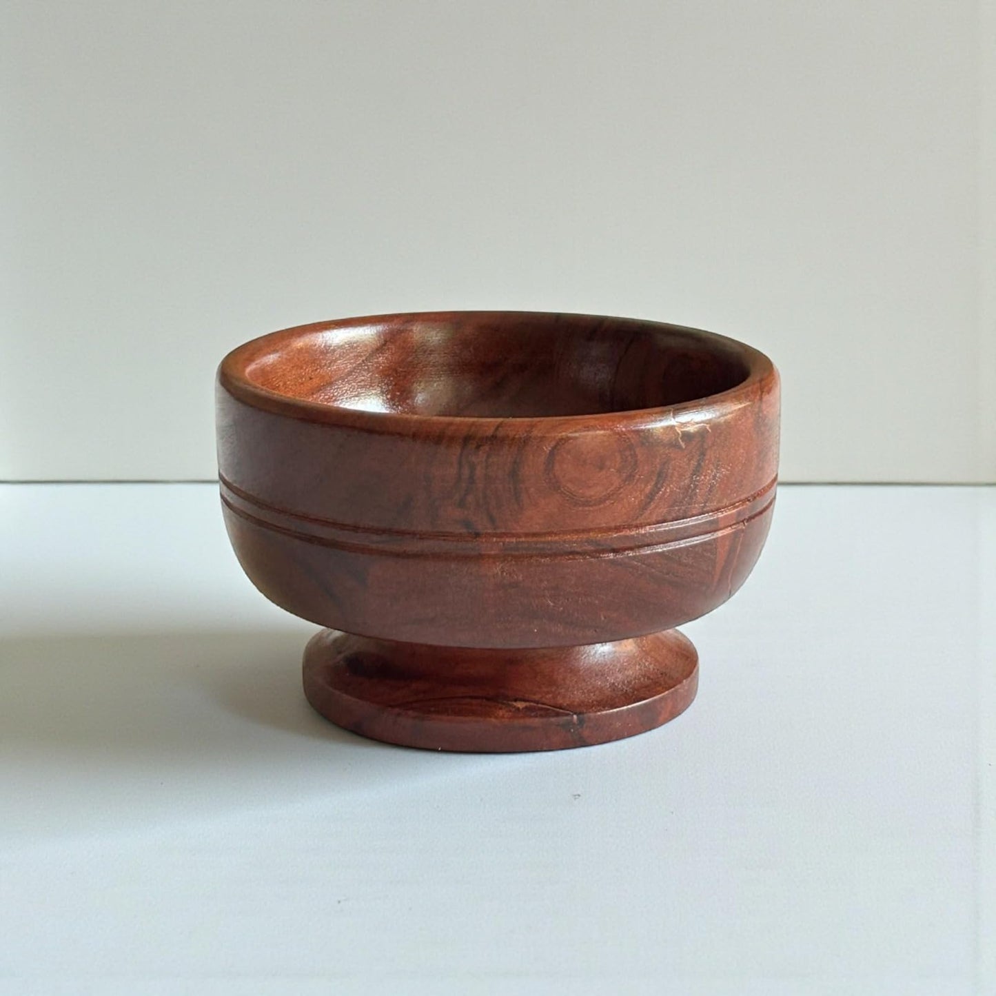 acacia wood pedestal serving bowl

small wooden snack bowl

handcrafted round wooden bowl

acacia serving dish kitchen décor