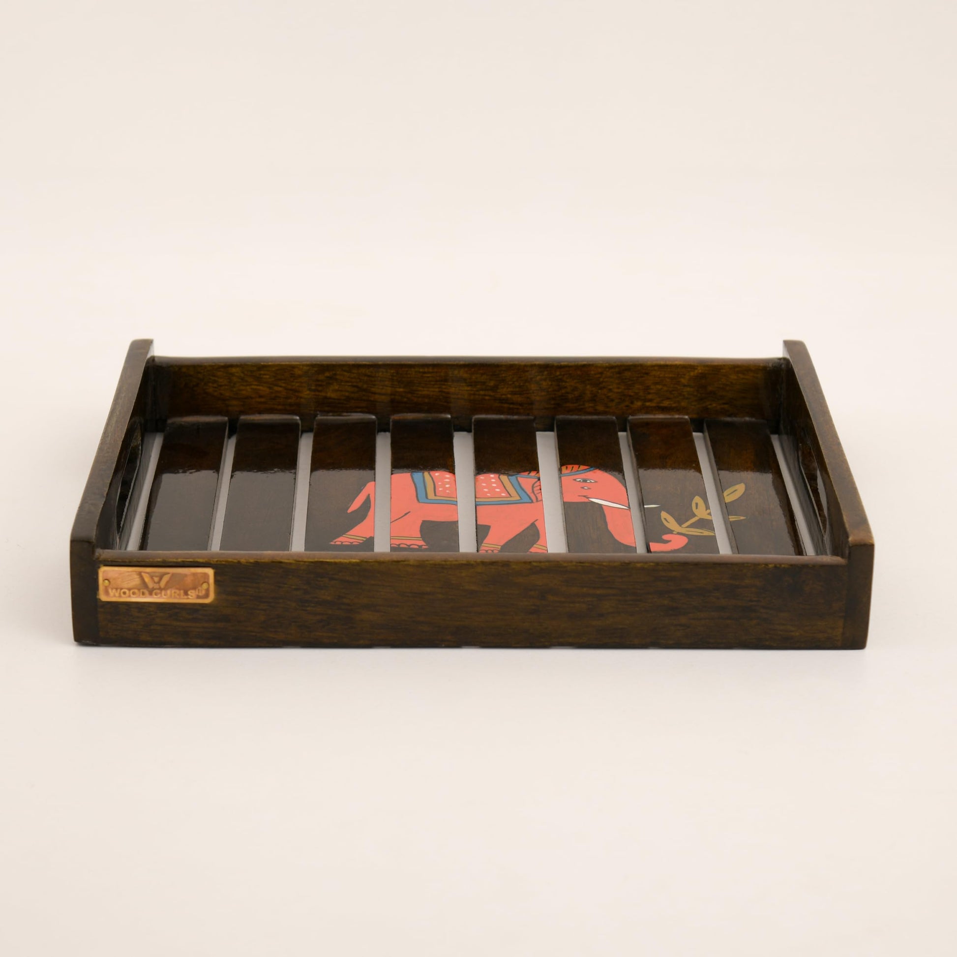 mango wood elephant serving tray

handcrafted wooden decorative tray

wooden tea snack serving tray

elephant design kitchen tray