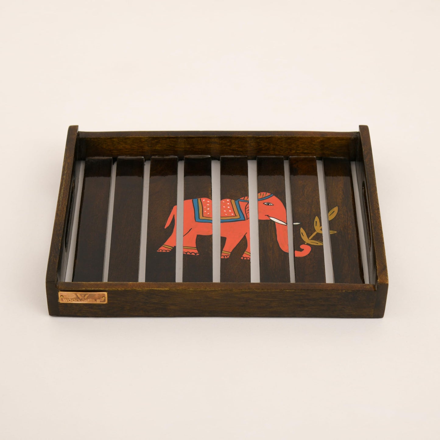 mango wood elephant serving tray

handcrafted wooden decorative tray

wooden tea snack serving tray

elephant design kitchen tray