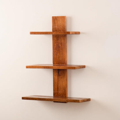 WOOD CURLS 3-tier wall-mounted shelf made of natural brown mango wood with visible grain patterns.