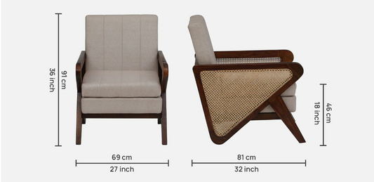 WOOD CURLS Aarav single seater sofa in provincial teak finish with beige upholstery and handwoven cane side panels.