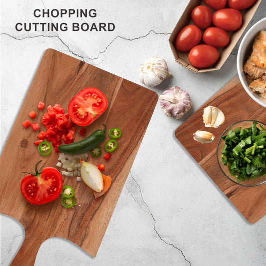 WOOD CURLS Cedaris acacia wood rectangular chopping board with curved edges and handle, featuring fresh vegetables.