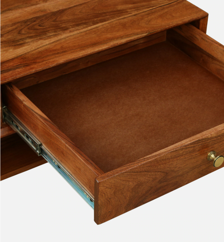 WOOD CURLS Eira acacia wood coffee table featuring an open drawer with smooth metal glides and a brass knob.