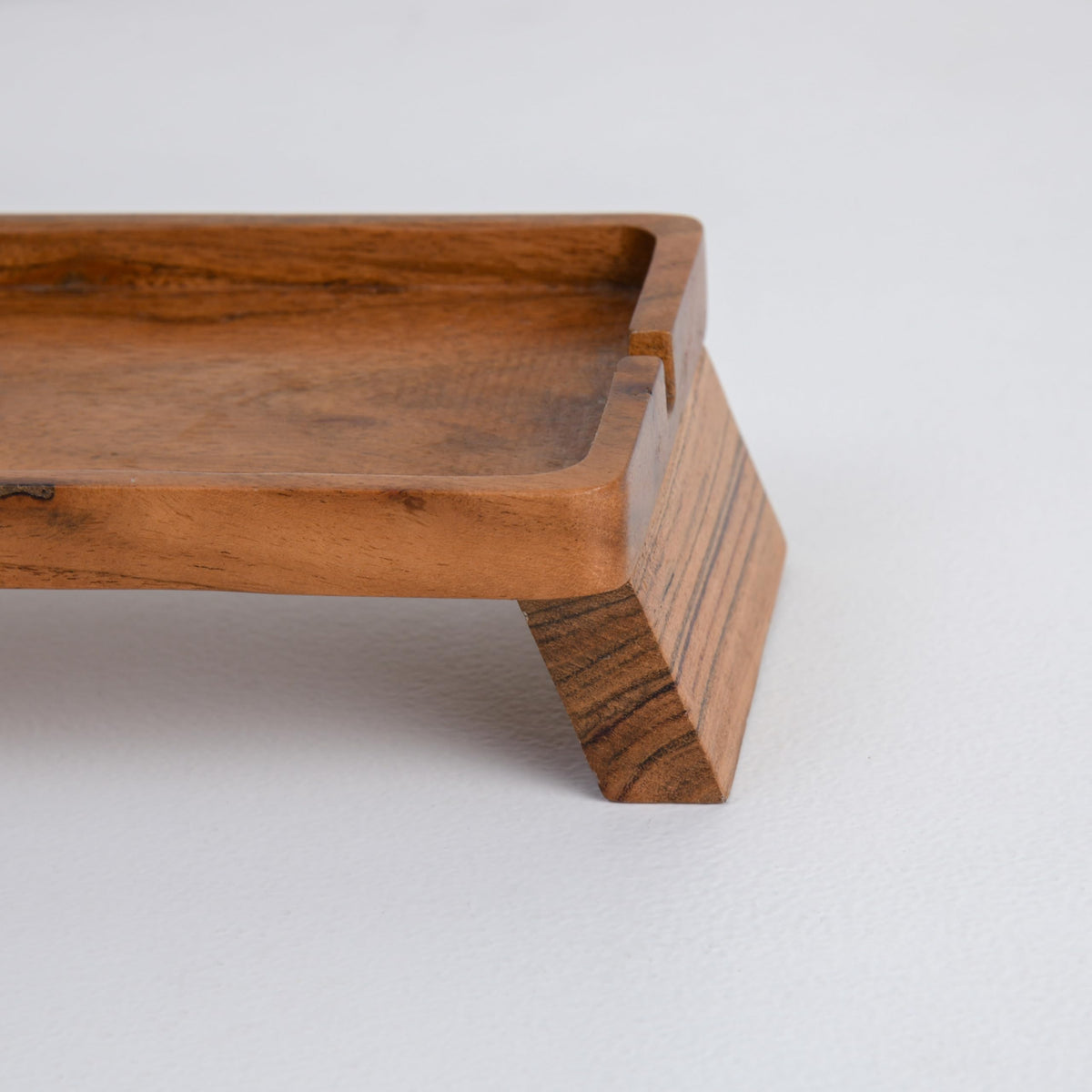WOOD CURLS handcrafted acacia wood desk organizer tray with a natural finish and sturdy angled legs