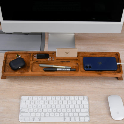 WOOD CURLS handcrafted acacia wood desk organizer with multiple compartments holding stationery and gadgets on a desk