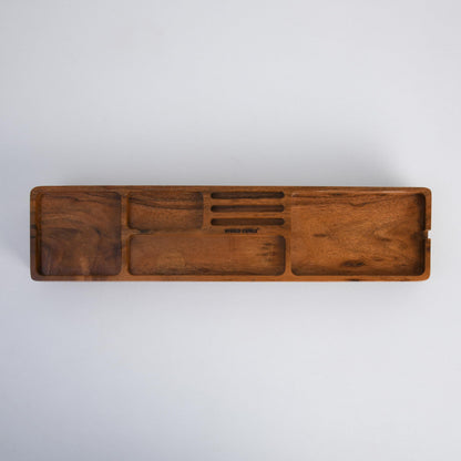 WOOD CURLS handcrafted acacia wood desk organizer with multiple compartments and a natural grain finish, top view.