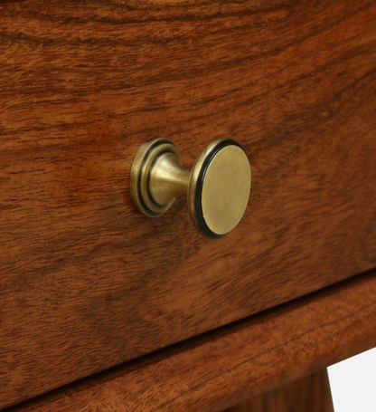WOOD CURLS Eira coffee table drawer featuring a round brass knob on rich natural grain solid acacia wood
