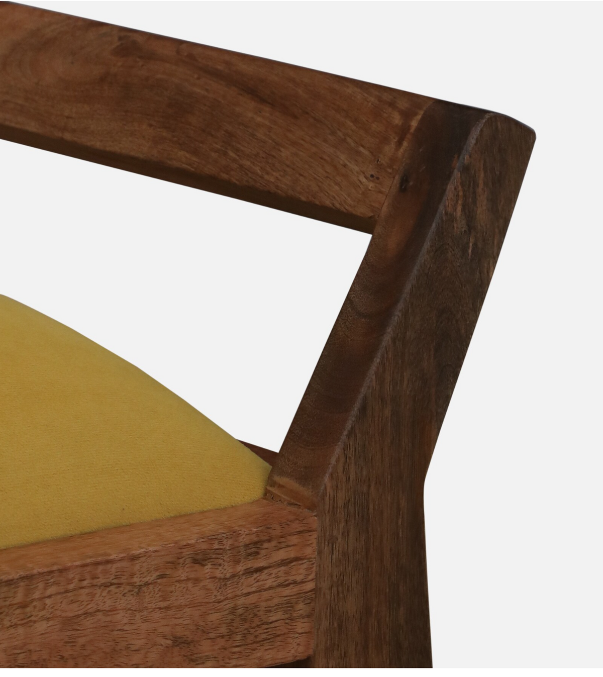 WOOD CURLS Alderra mango wood bench featuring a mustard velvet seat and natural wood grain armrest detail.