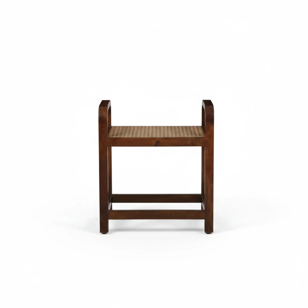 WOOD CURLS Bendora mango wood side table with a walnut finish and a handwoven cane seat in a traditional design.