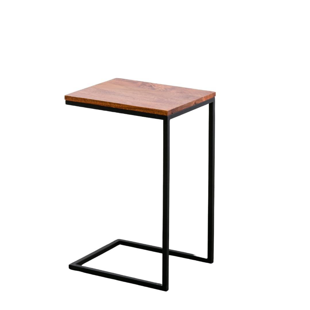 WOOD CURLS Odyssey C-shape side table with a warm mango wood top and a sturdy black iron frame for small spaces.