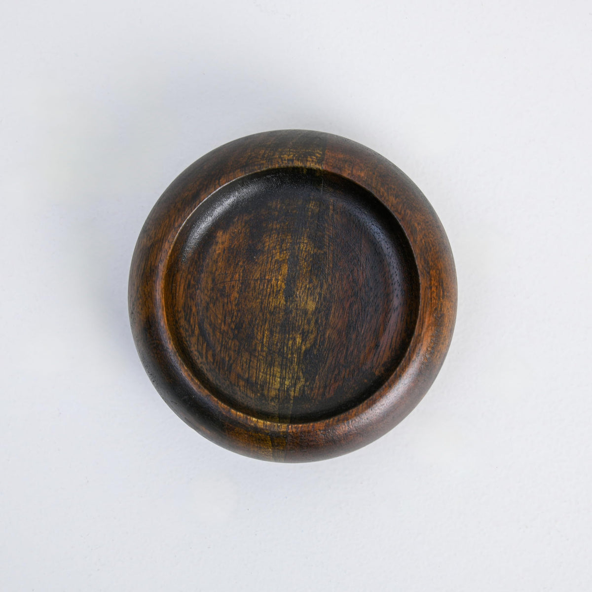 WOOD CURLS handcrafted dark brown wooden bowl ashtray with a smooth polished finish and deep circular design.