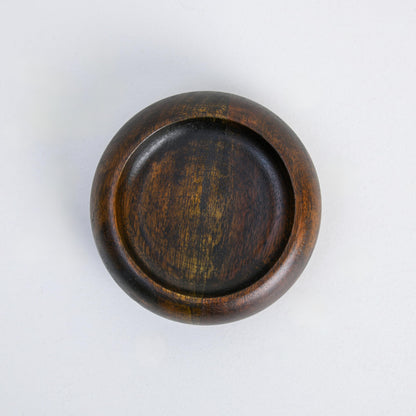 WOOD CURLS handcrafted dark brown wooden bowl ashtray with a smooth polished finish and deep circular design.