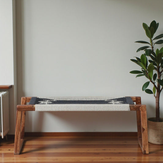 WOOD CURLS Eira 2 seater bench made of natural Sheesham wood with a hand-woven monochrome cotton rope seat.