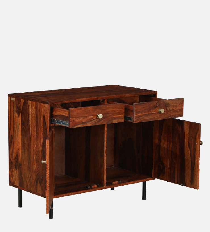 WOOD CURLS Elyssian Sheesham wood sideboard in honey oak finish with two open drawers and two open cabinet doors.