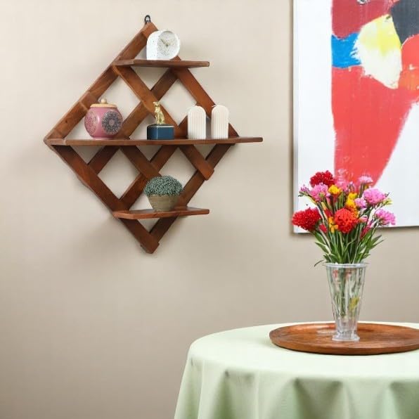 WOOD CURLS diamond-shaped mango wood wall shelf with geometric criss-cross design displaying decorative home items.