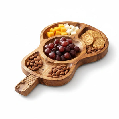 WOOD CURLS guitar shaped wooden serving platter with divided compartments filled with cheese, grapes, and almonds.
