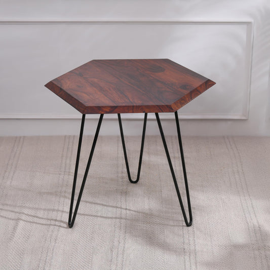 WOOD CURLS hexagon side table with a rich sheesham wood top and black industrial metal hairpin legs.