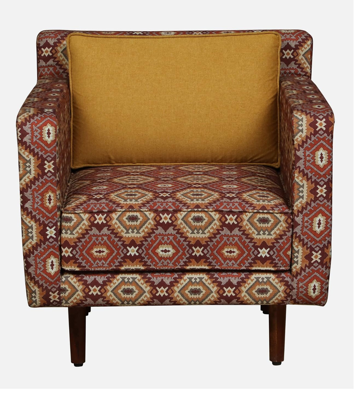 WOOD CURLS accent armchair featuring a geometric Ikat fabric pattern in warm tones with a solid mustard yellow cushion.