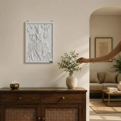 WOOD CURLS white 3D Krishna wall art panel featuring a flute-playing Krishna and cow, mounted in a serene living room.