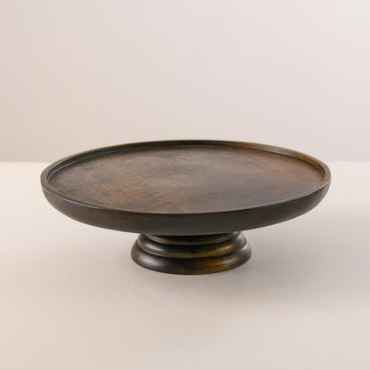 WOOD CURLS round mango wood pedestal cake stand with a rich walnut finish for elegant dessert display.