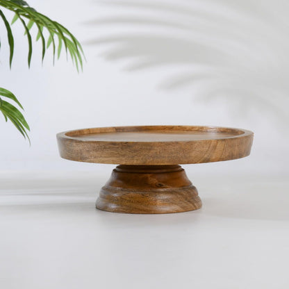 WOOD CURLS 23 cm round mango wood pedestal cake stand with a natural wood grain finish for elegant dessert display.