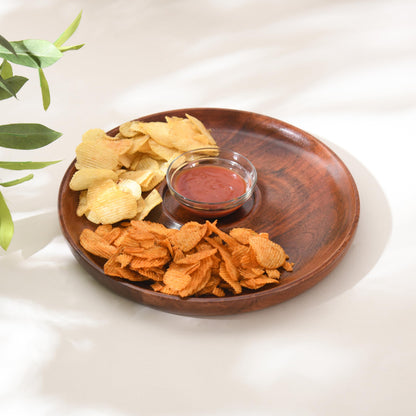 WOOD CURLS handcrafted round mango wood chip and dip serving platter with snacks and a glass bowl of sauce