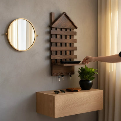 WOOD CURLS rustic mango wood house-shaped wall key holder with 6 hooks mounted above a floating wooden shelf