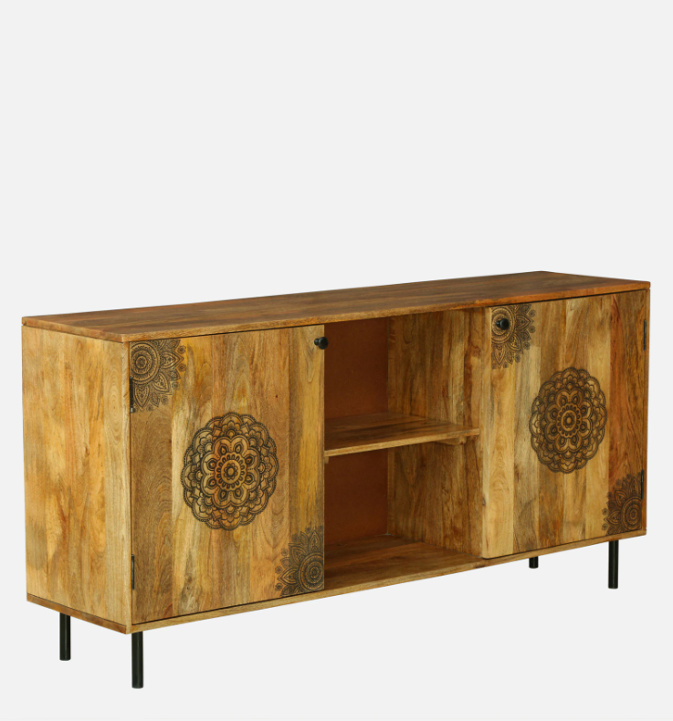 WOOD CURLS handcrafted mango wood cabinet with intricate mandala carvings on doors and black metal legs.