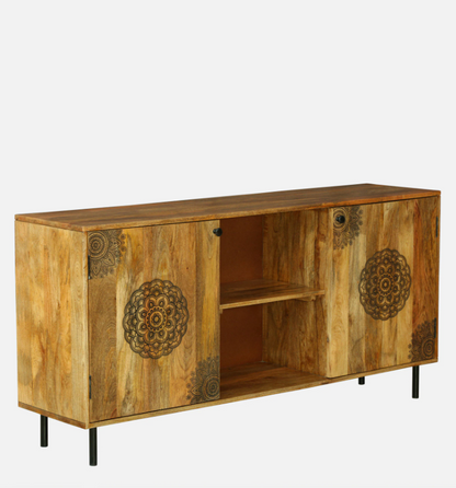 WOOD CURLS handcrafted mango wood cabinet with intricate mandala carvings on doors and black metal legs.