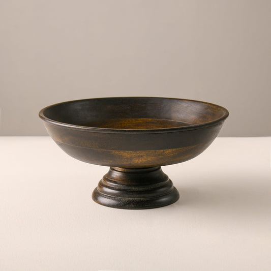 WOOD CURLS handcrafted mango wood pedestal bowl with a natural walnut finish, perfect for fruit or table decor.