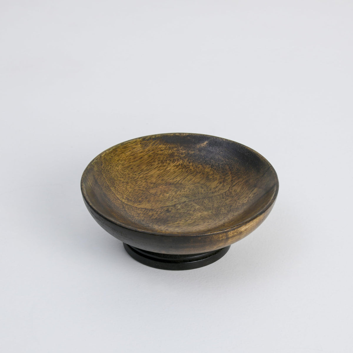 WOOD CURLS small round mango wood pedestal bowl with a dark brown walnut finish for table décor and fruit display.