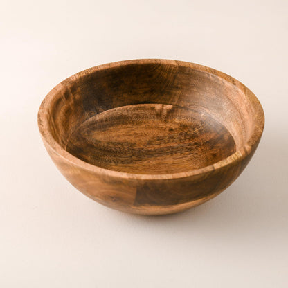 WOOD CURLS 10-inch round mango wood serving bowl with natural grain patterns, perfect for salads or fruit.