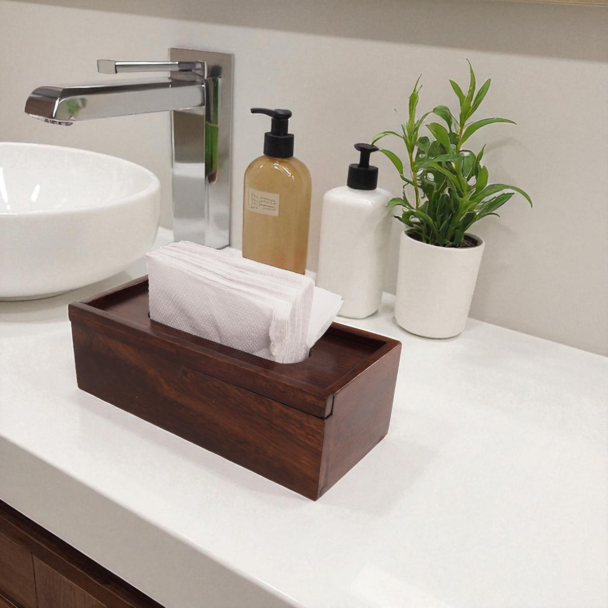WOOD CURLS mango wood tissue holder with natural grain finish on a modern bathroom vanity counter.