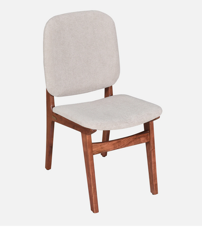 WOOD CURLS Marlow dining chair with solid acacia wood frame and light beige upholstered seat and backrest