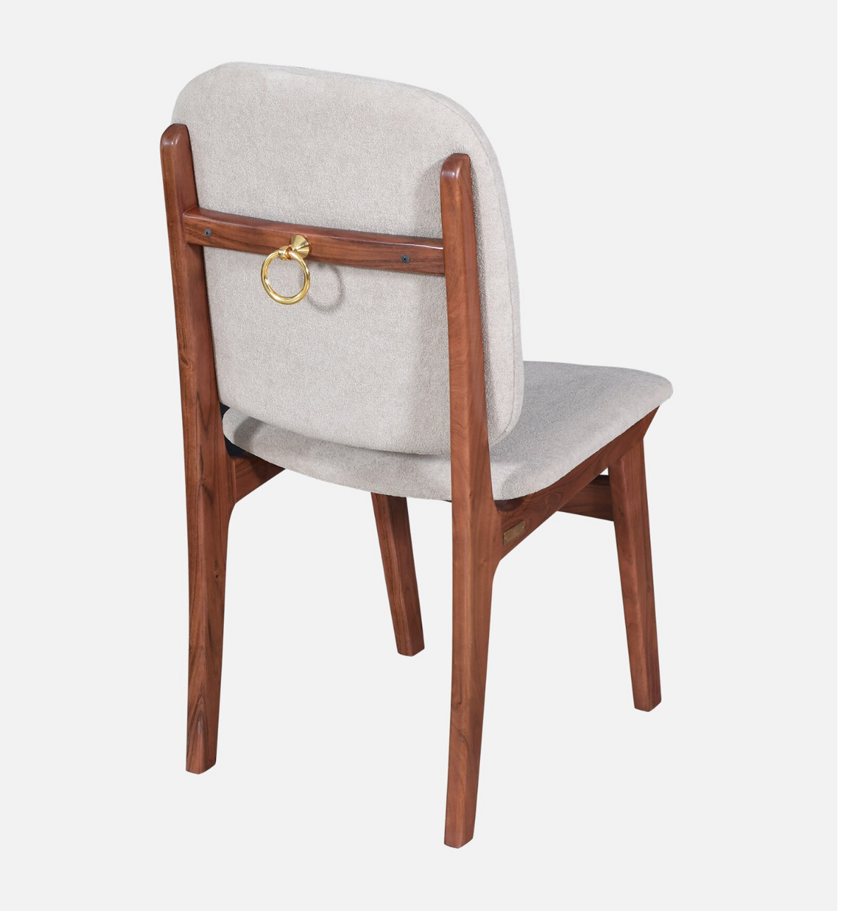 WOOD CURLS Marlow dining chair in acacia wood with light grey upholstery and a decorative gold ring on the backrest.