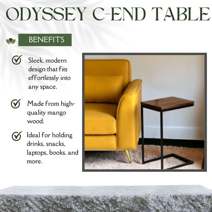 WOOD CURLS Odyssey C-shape side table with a warm mango wood top and black iron frame next to a yellow sofa.