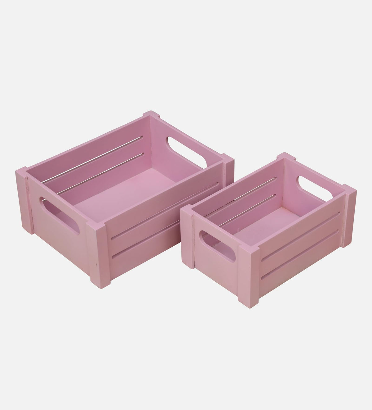 WOOD CURLS set of two pink wooden storage crates with slatted sides and built-in handles for home organization.