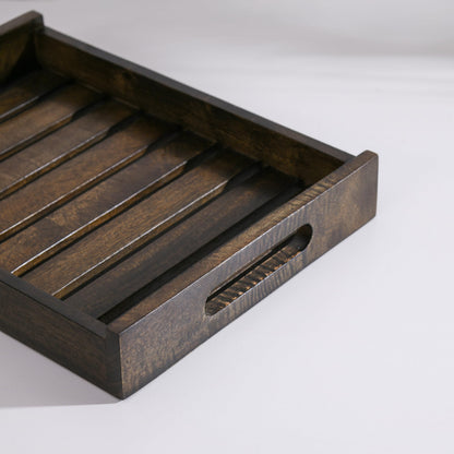 WOOD CURLS rectangular mango wood serving tray with a dark natural finish and integrated side handles