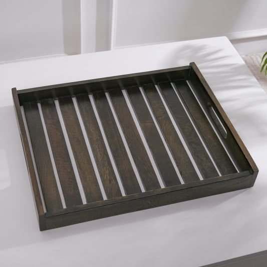WOOD CURLS rectangular dark mango wood serving tray with a slatted base design on a white surface.