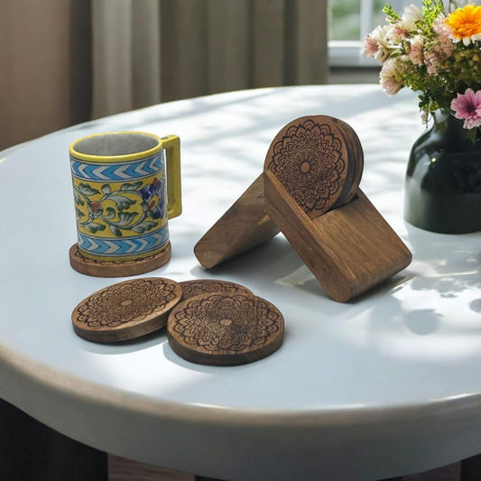 WOOD CURLS set of 6 round mango wood tea coasters with intricate floral engravings and a matching wooden storage stand.