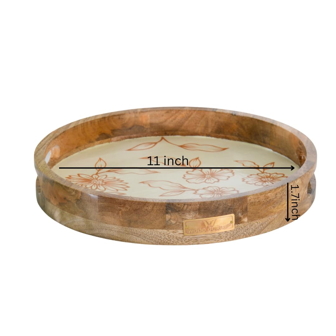 WOOD CURLS round mango wood serving tray with a cream base and hand-painted copper floral design and side handles.