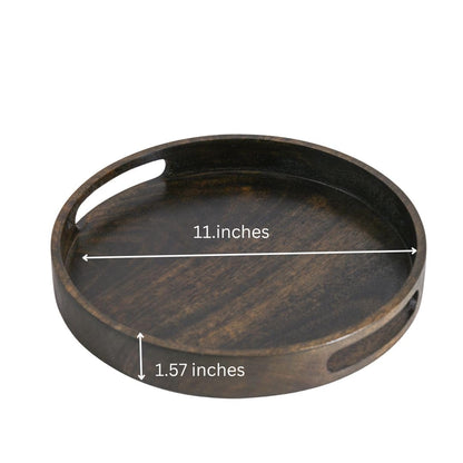 WOOD CURLS round mango wood serving tray in a rich walnut finish with ergonomic handles and visible wood grain.