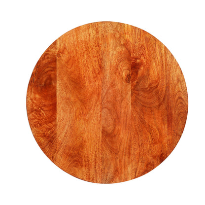 WOOD CURLS Mirage round coffee table in natural mango wood with a smooth, polished grain finish, top-down view.