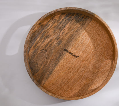 WOOD CURLS round wooden serving tray with a natural brown finish and visible wood grain on a white background