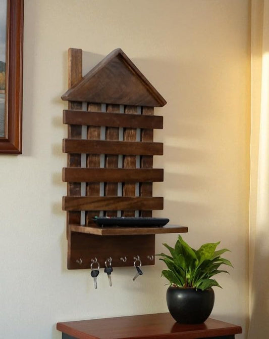 WOOD CURLS rustic mango wood wall-mounted key holder with house design, 6 hooks, and a small shelf for entryway storage.
