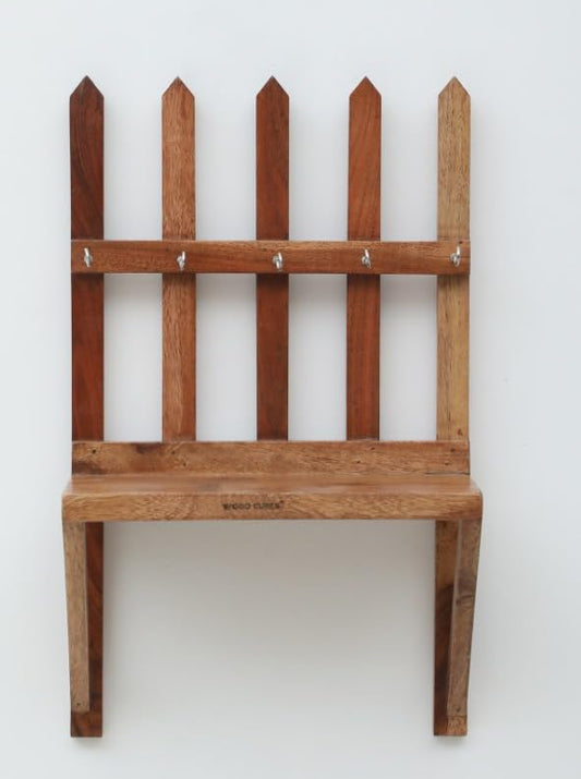 WOOD CURLS rustic Sheesham wood wall-mounted key holder with a fence design and five metal hooks for home organization.